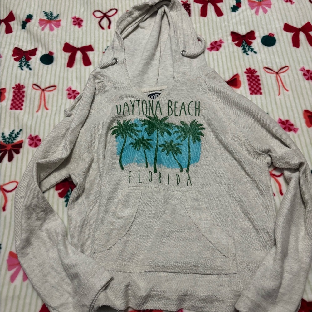 Cream and Green Sweater with Tropical Graphic Design